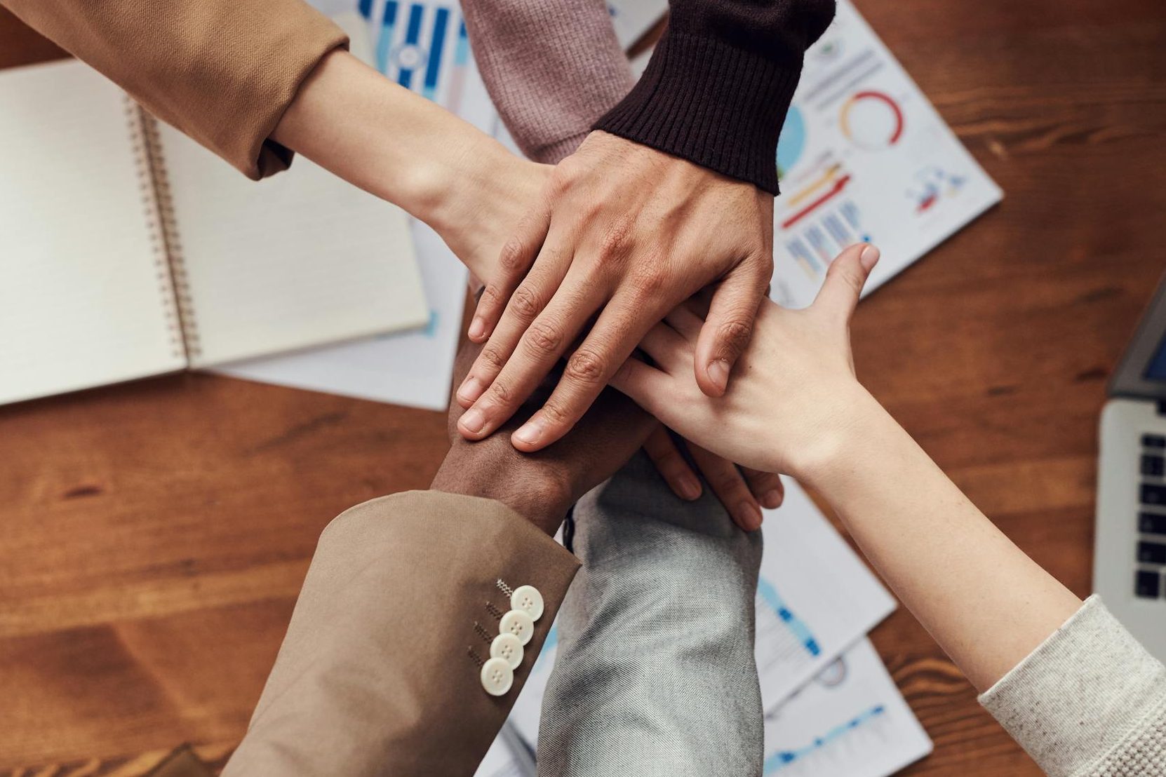 Photo Of People Near Wooden Table